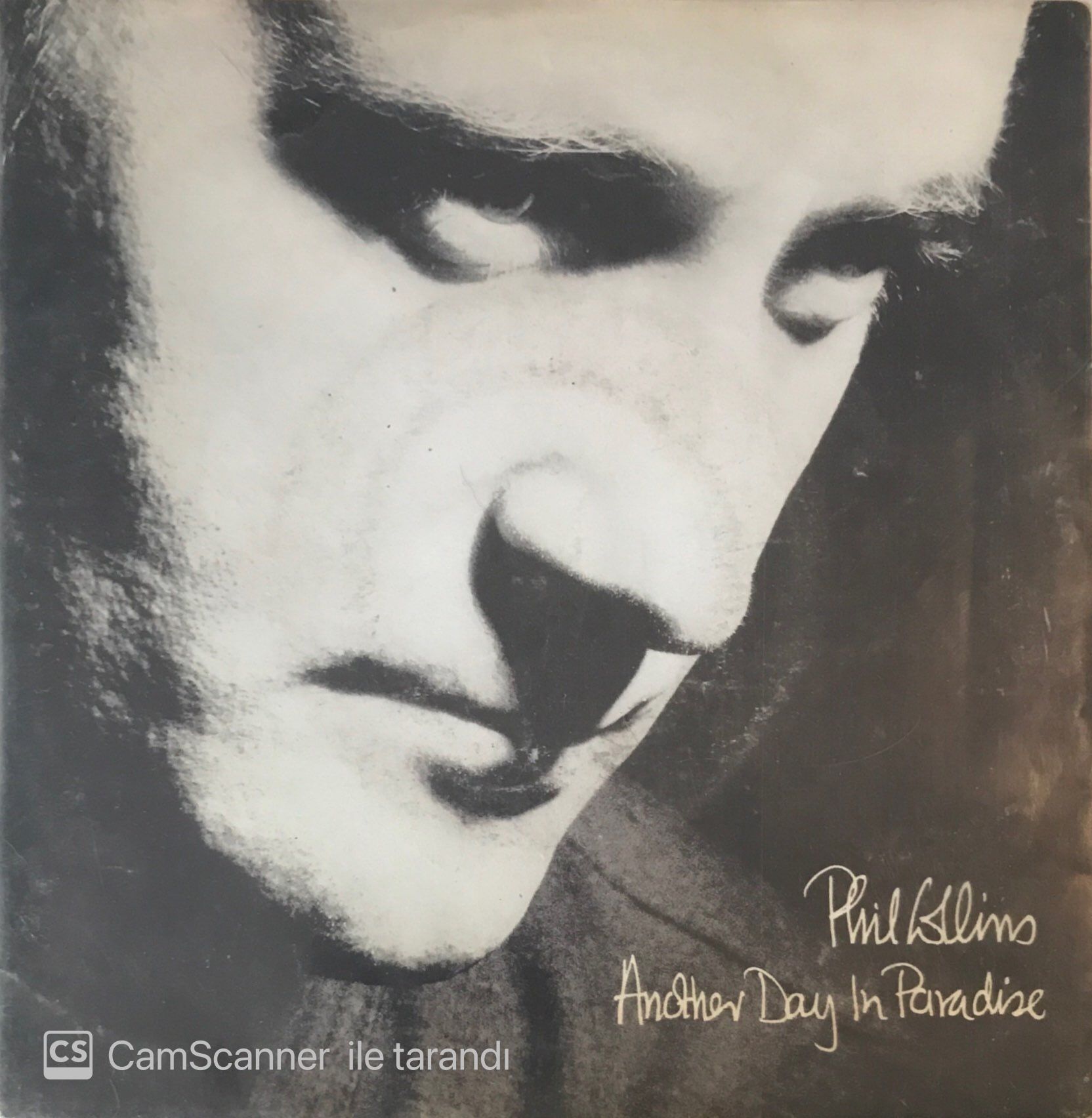 Phill Collins Another Day In Paradise 45lik